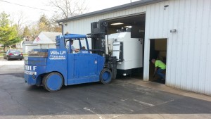 Our Okuma 560V being put into the building.